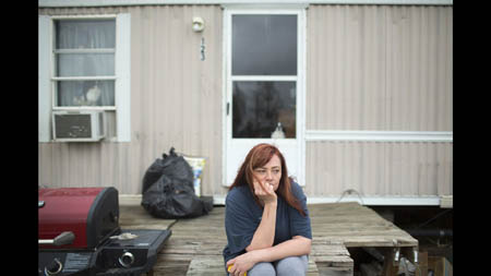 'This is home,' said Roberta Blevins, 43, one of fewer than 10 people still living in Picher. Blevins and her husband moved into the town of Picher nine years ago after a tree fell on their home in nearby Douthat, Okla., killing their six-year-old daughter. Trying to protect her then-12-year-old son, she didn't want to uproot him from the school he was already happily attending in Picher. Seeing her struggle to find a place to live in the area, some community members in Picher helped arrange a land swap and a good deal on a trailer near the school, she said. 'Picher is the kind of community that when something happens to one of their own, people come together and help. They'll do what they can do.'
